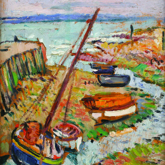 boats at low tide in a harbour