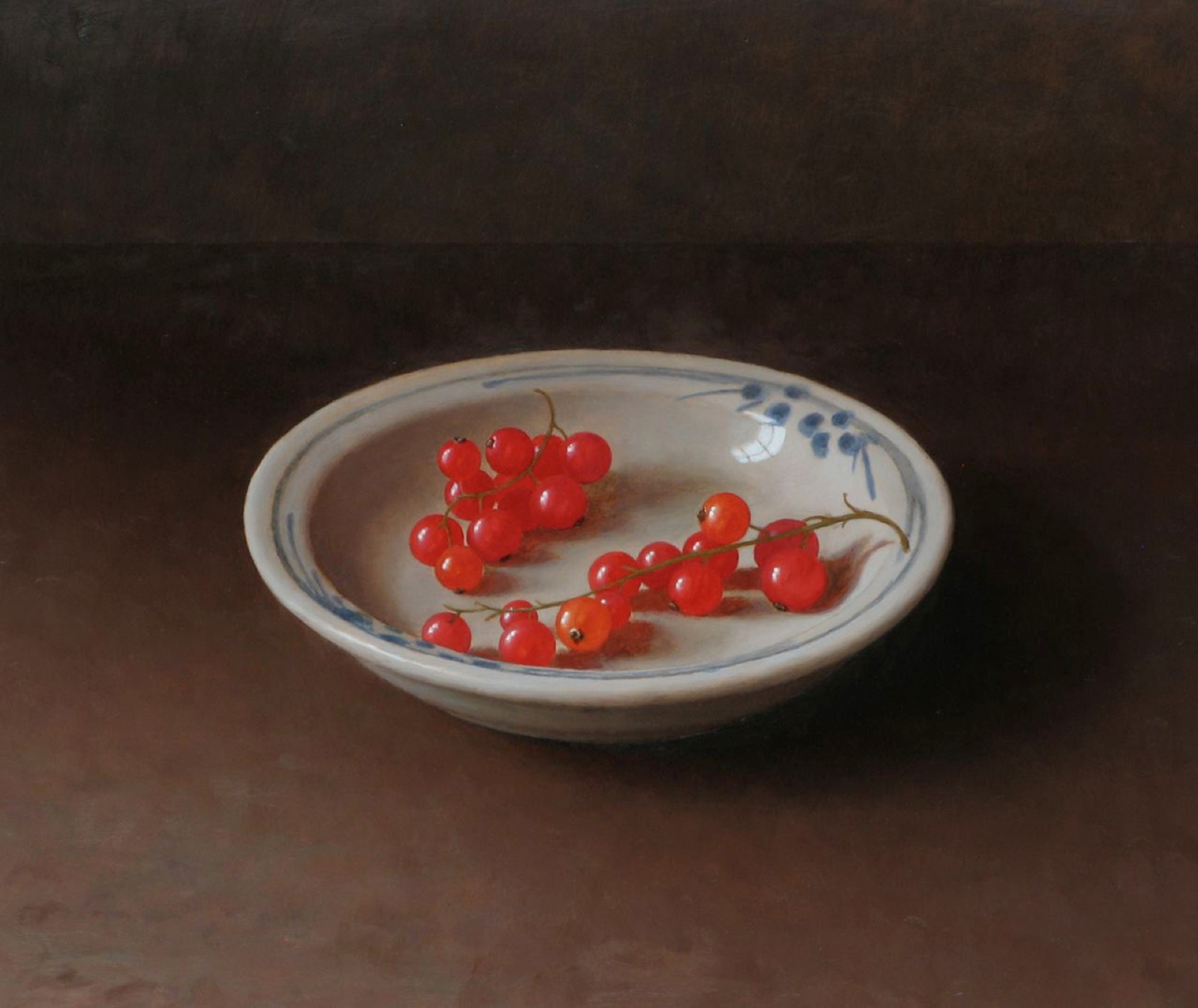 a dish with redcurrants in it on a shelf
