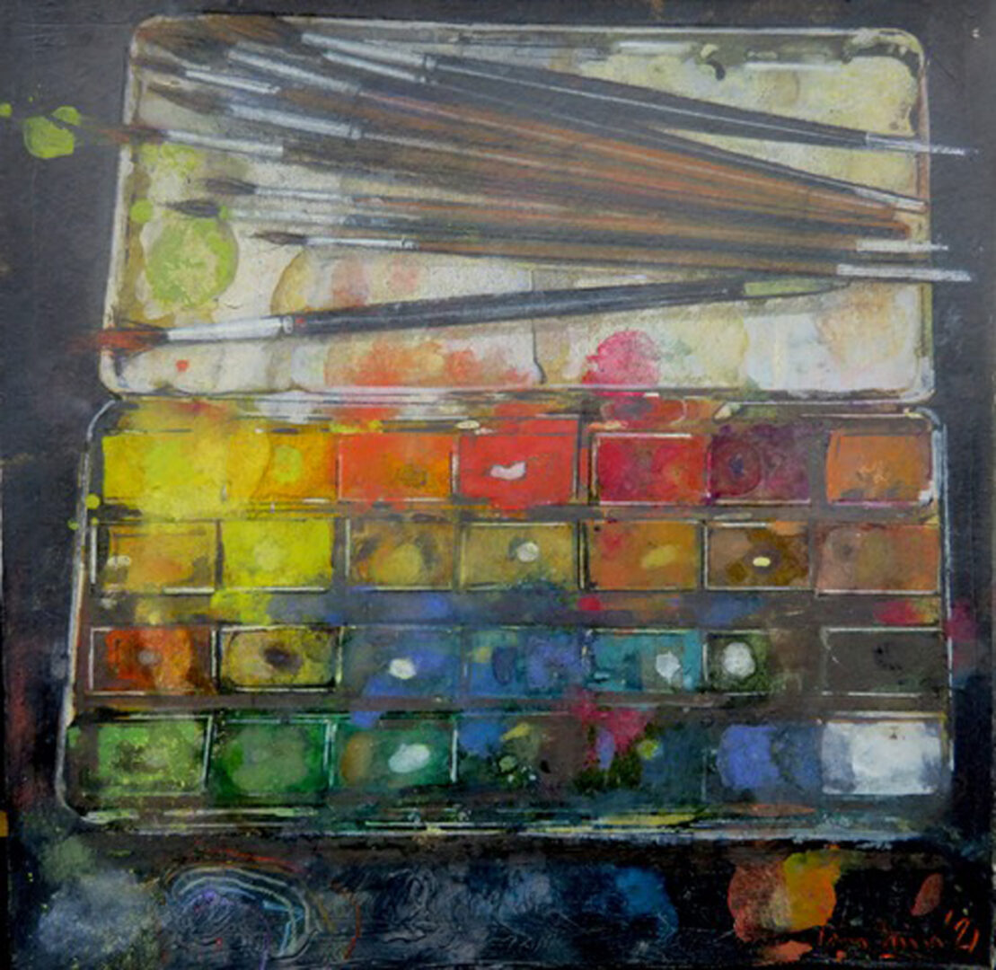 a paint box and brushes