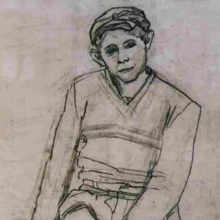 a boy kneeling